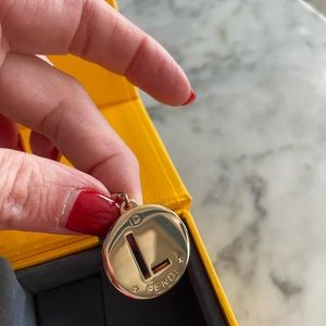 Fendi ID charm. Letter “L”.  1” in size.